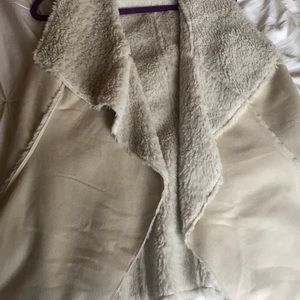Suede boutique vest with faux fur lining
